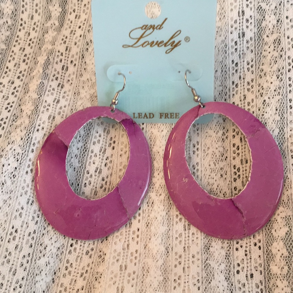 And Lovely pierced ear rings.